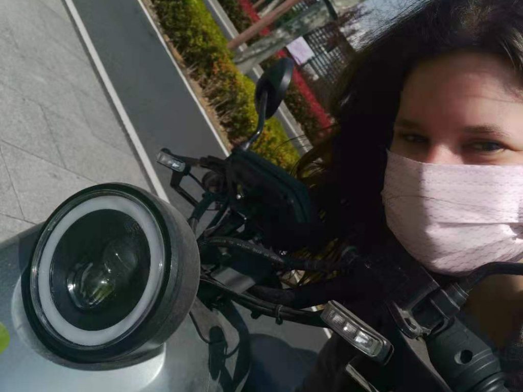 International Customer Service Manager with her NIU scooter
