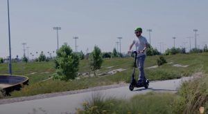 Jon Rettinger testing out the KQi3 kick scooter