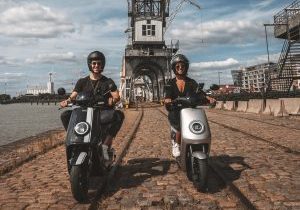 50cc and 125cc electric scooter equivalents riding together